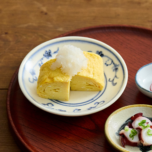 繁栄を象徴するつる草をいきいきと表現